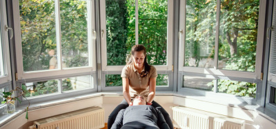 American Chiropractic Haus - Chiropractic Adjustment for Neck Pain and Headaches