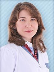 Dr. Elena Merticariu - Dr. Elena Merticariu