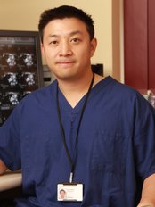 الدكتور إريك وو استشاري الأشعة - Dr Eric Woo Consultant Radiologist