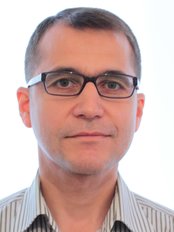 Dr. M. Erman Emre , M.D - Dr. M. Erman Emre , M.D