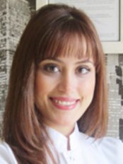 Dt. Özge Asmacık Yağcı - Dt. Özge Asmacık Yağcı